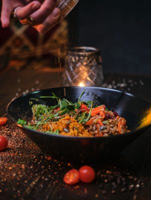 cooked-vegetarian-bowl-of-plov-on-a-wooden-table-2025-01-25-01-22-52-utc.jpg